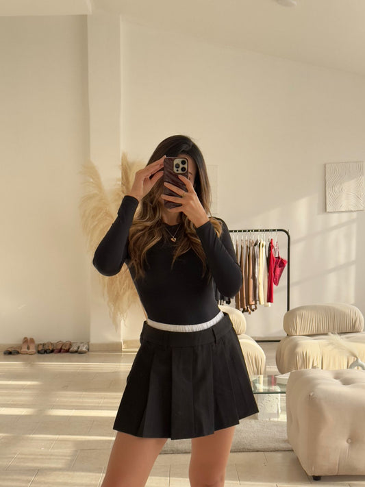 FALDA NEGRA PRENSES BORDE BLANCO