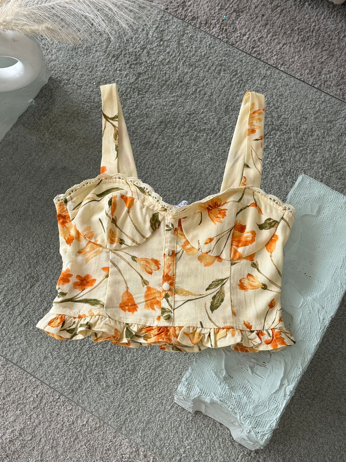 CROP TOP BOTONES FLORAL AMARILLO